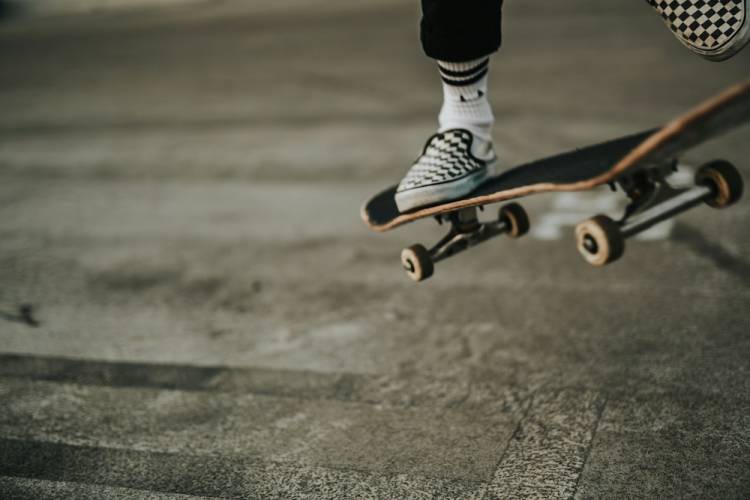 Teen skating at skate park